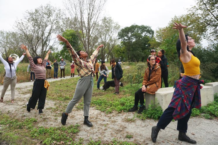 Group engaged in outdoor exercise at Big Marsh Park in the Calumet Corridor, Chicago