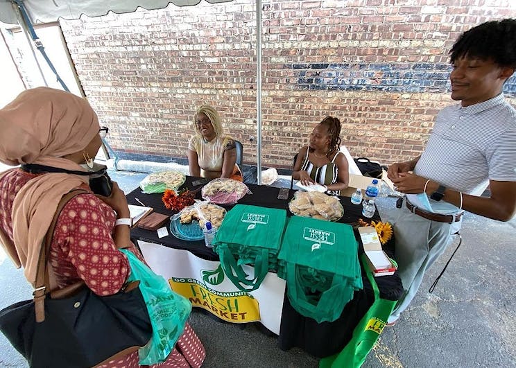 Informational table with community residents
